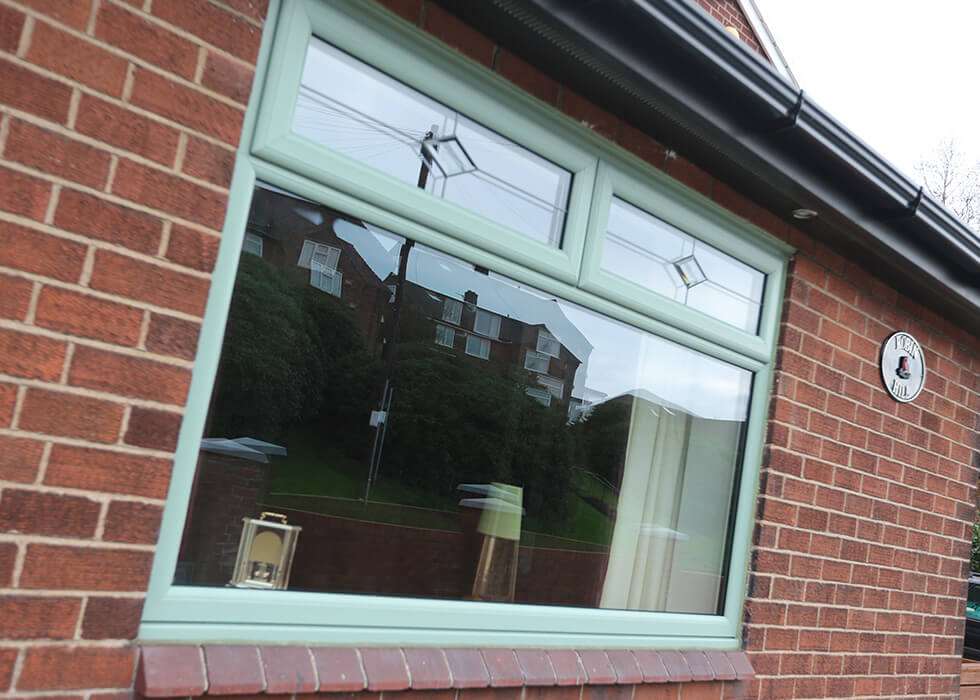 https://www.stedek.co.uk/wp-content/uploads/2018/04/Chartwell-green-uPVC-casement-window.jpg