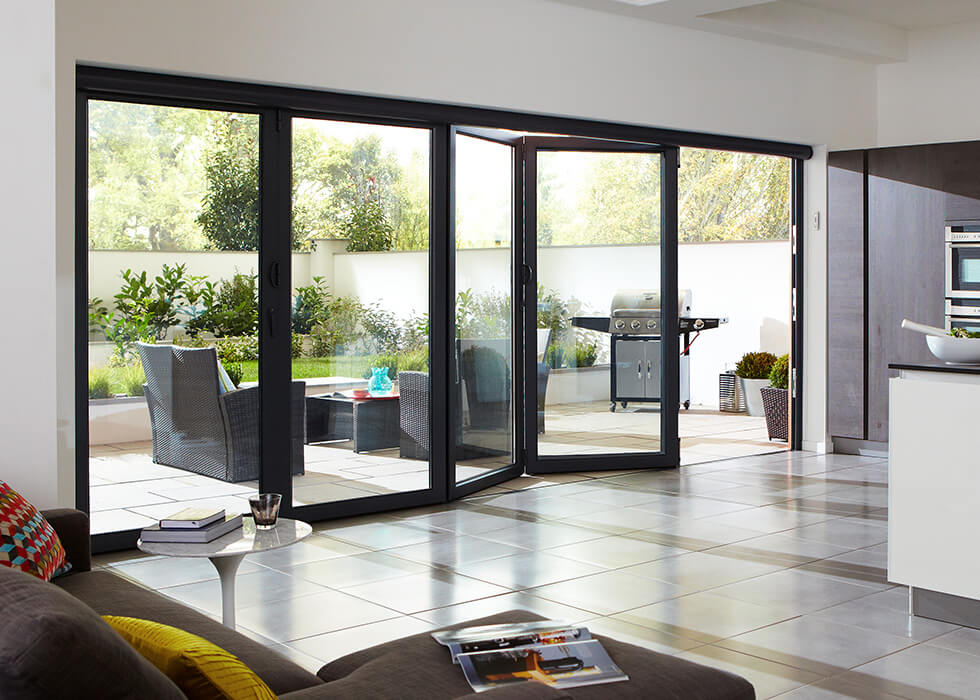 https://www.stedek.co.uk/wp-content/uploads/2018/04/Kitchen-aluminium-bifold-door.jpg