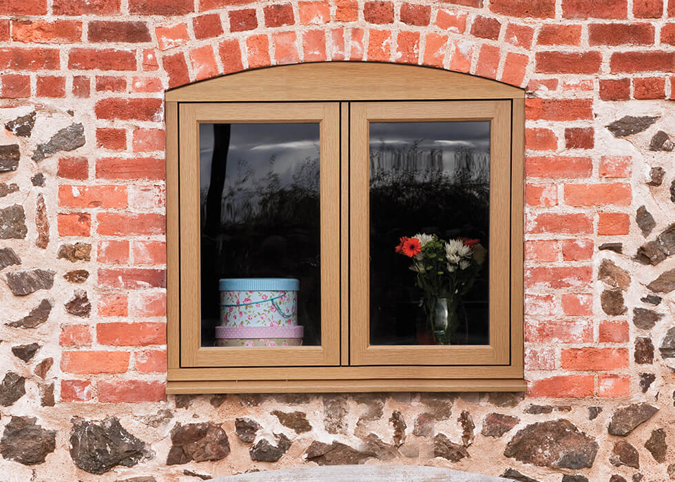 https://www.stedek.co.uk/wp-content/uploads/2018/04/Oak-effect-Residence-9-Window.jpg