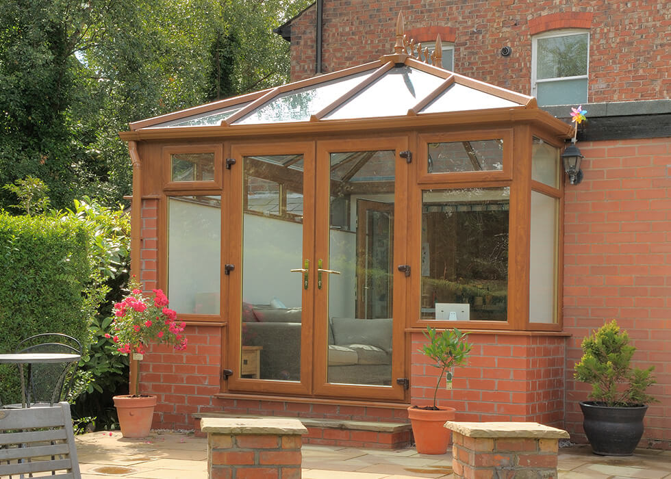 https://www.stedek.co.uk/wp-content/uploads/2018/04/Oak-effect-edwardian-conservatory.jpg