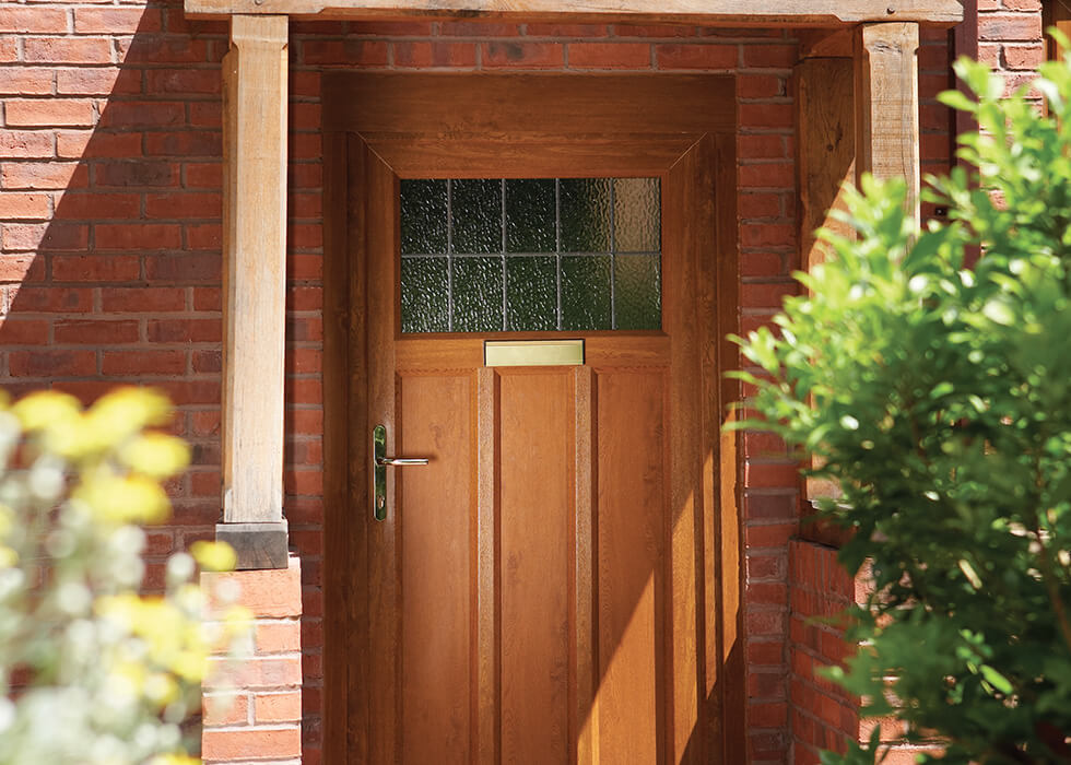 https://www.stedek.co.uk/wp-content/uploads/2018/04/Oak-effect-uPVC-entrance-door.jpg