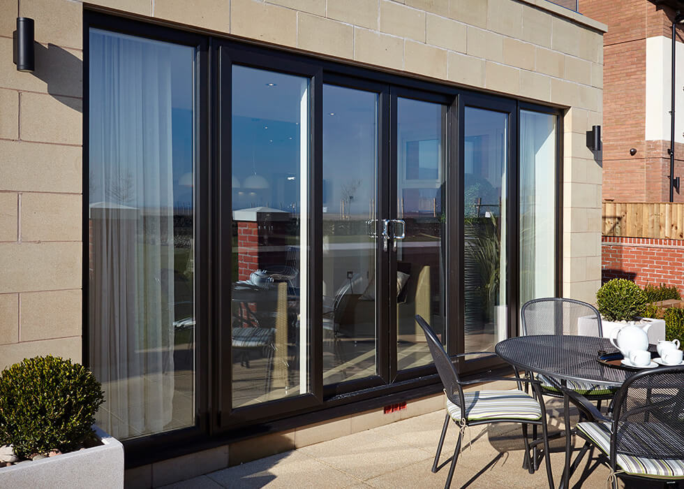 https://www.stedek.co.uk/wp-content/uploads/2018/04/Patio-Master-black-sliding-door.jpg