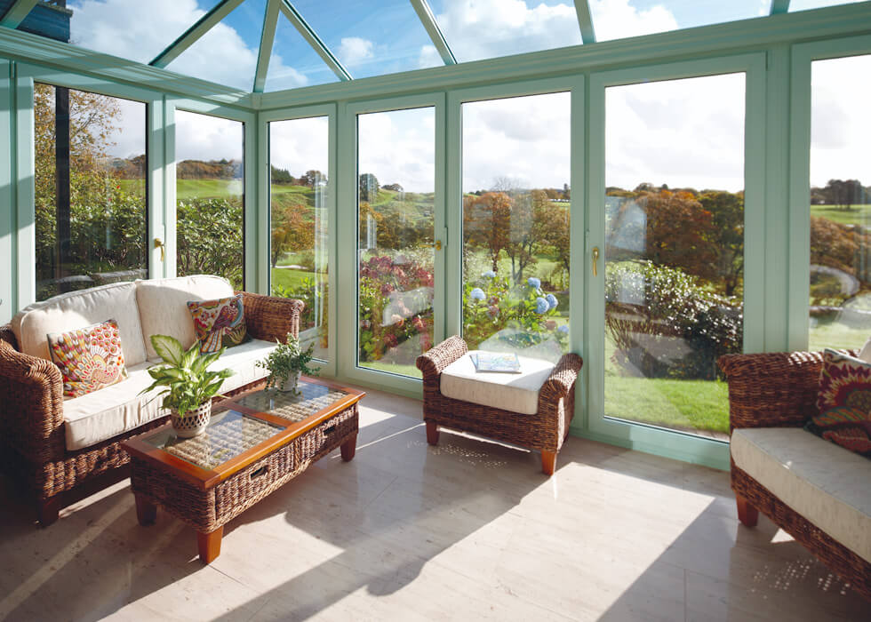 https://www.stedek.co.uk/wp-content/uploads/2018/06/Chartwell-Green-Swish-conservatory-interior.jpg